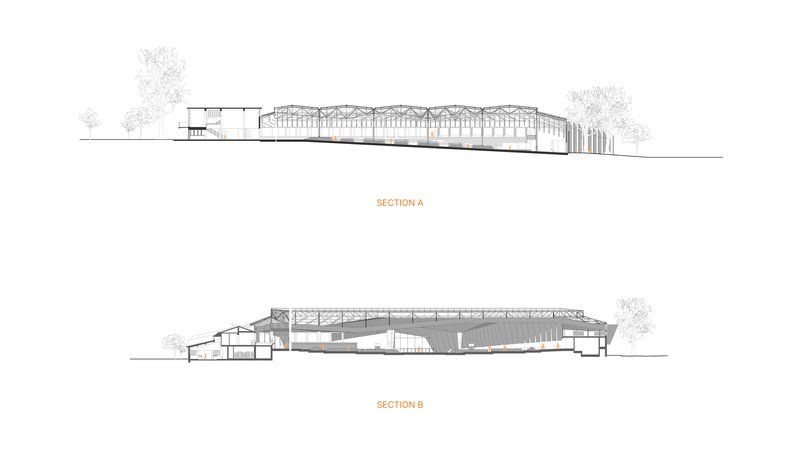 Two building section drawings revealing the arched roof structure and interior spatial volumes