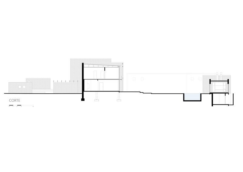 Section drawing showing a two-story volume connected to a single-story linear wing