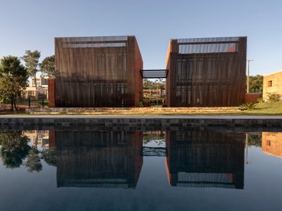 BAUEN Builds Two Rammed Earth Volumes in Paraguay Inspired by the Ovenbird's Nest
