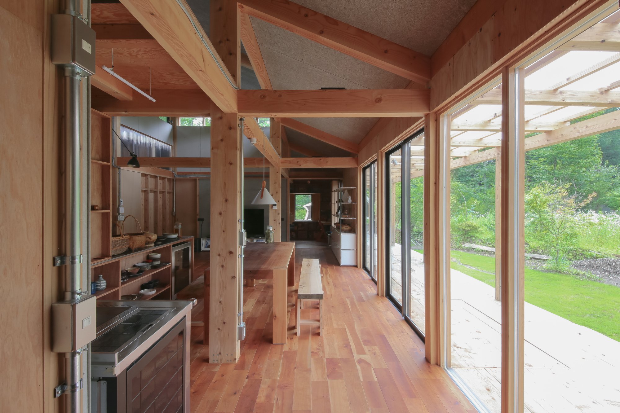 Satoru Ito Architects Stretches a 25-Meter Timber Villa Across a Karuizawa Forest Clearing