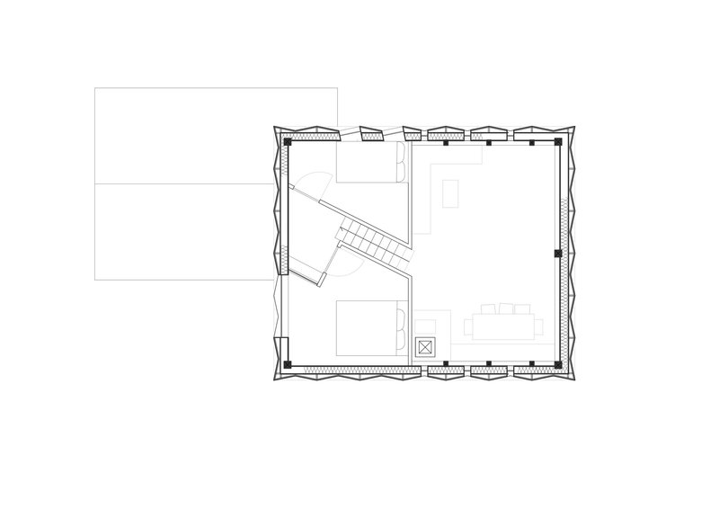 Floor plan drawing showing a rectangular volume with diagonal stair and central kitchen
