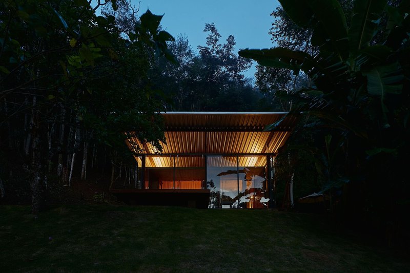 gru.a Distills Domestic Life into a 50-Square-Meter Glass and Brick Shelter in the Brazilian Mountains