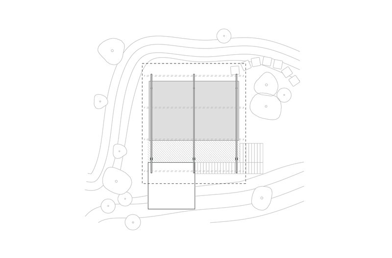 Roof plan drawing indicating two solid volumes with an open deck and adjacent staircase