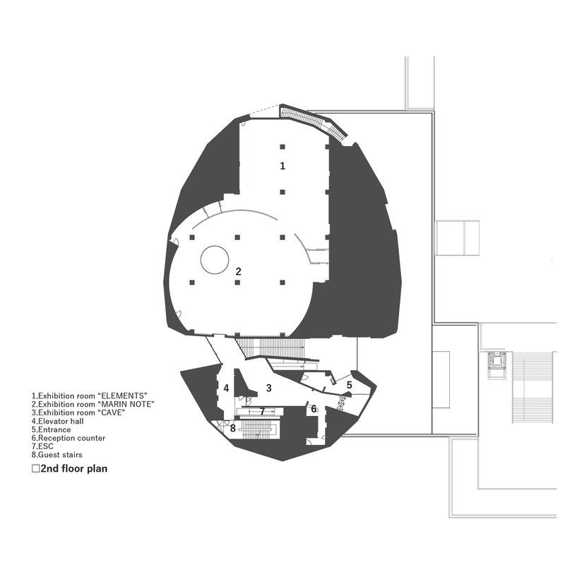 Second floor plan drawing showing rounded exhibition spaces and elevator hall in an organic form