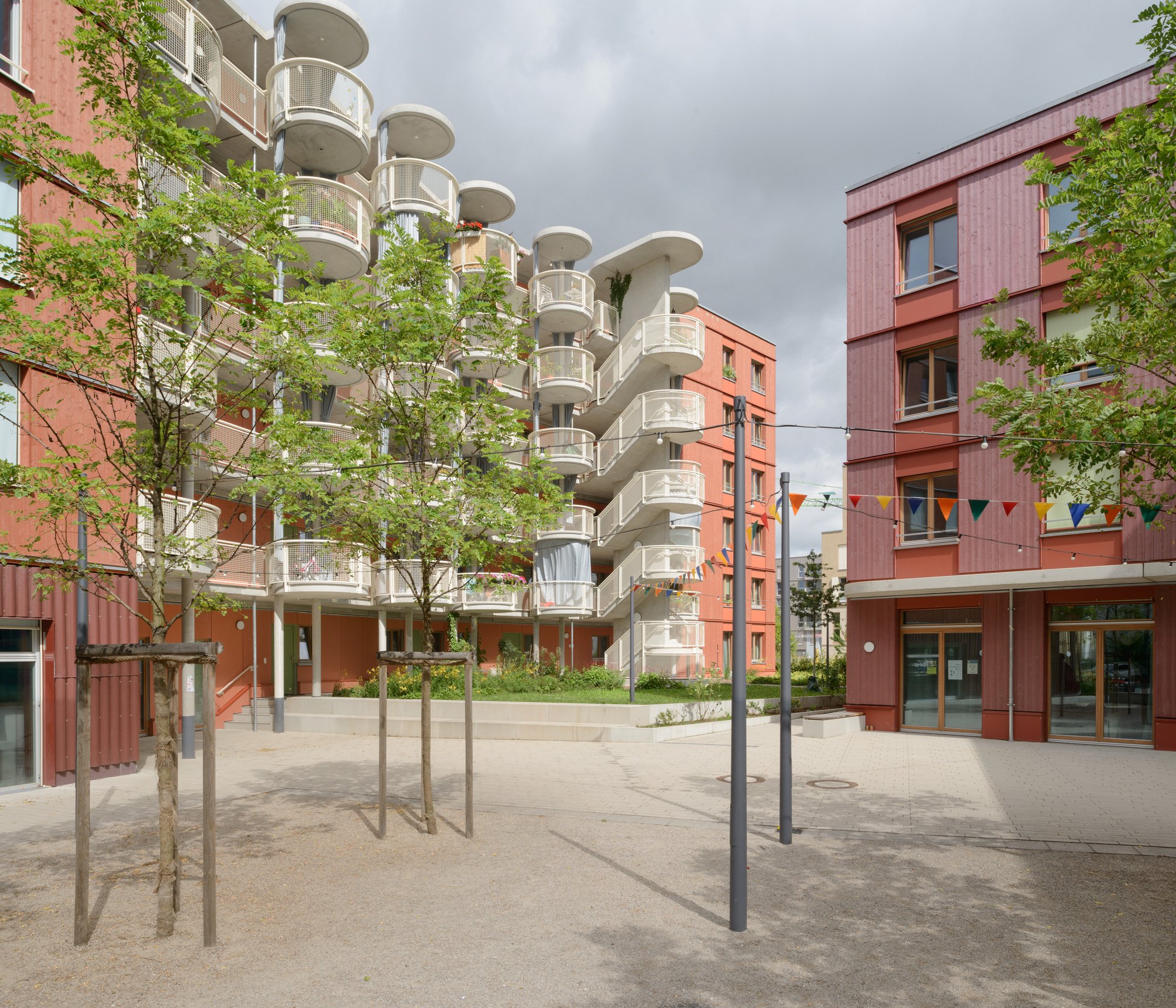 Four Offices Design a Timber-Hybrid Housing Cooperative on Munich's Largest Expansion Site