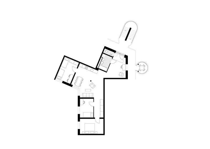 Unit floor plan drawing showing angled rooms with kitchen, bathroom, and bedroom spaces