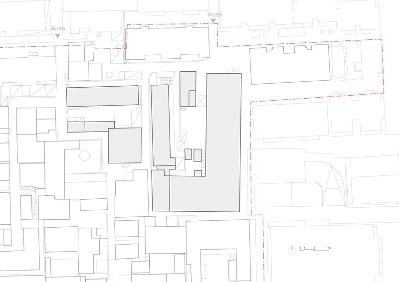 Site plan drawing showing the existing urban block with surrounding streets and building footprints
