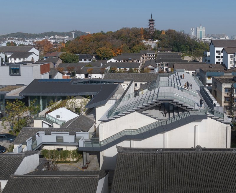 SpActrum Stitches a Thousand-Year-Old Shaoxing Block Back Together with Steel, Glass, and Rooftop Corridors