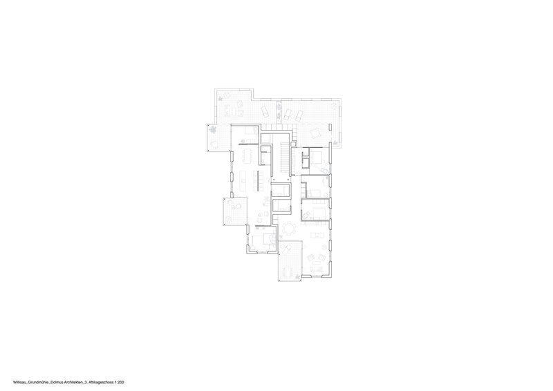 Second floor plan drawing showing residential units with a staircase at the center