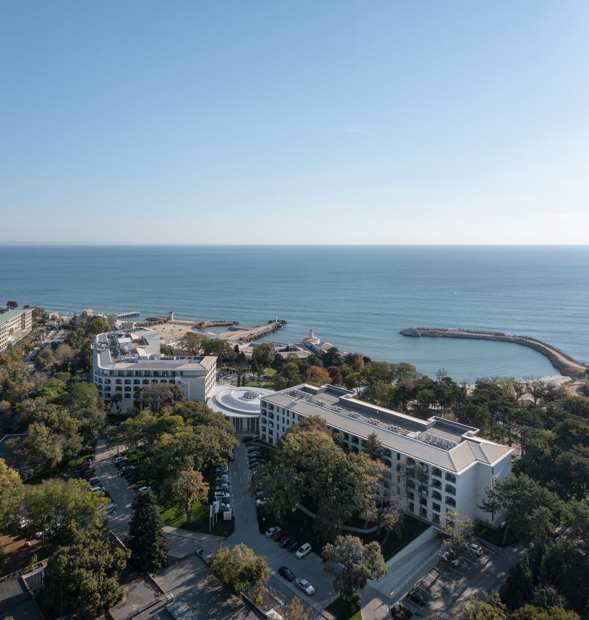 STARH Wraps 420 Rooms in Flattened Arches to Preserve a Century-Old Pine Forest on the Black Sea