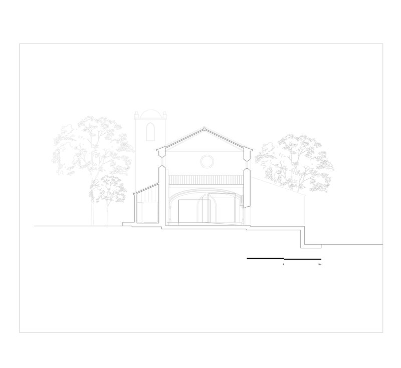 Elevation drawing showing a chapel-like facade with tower, gabled roof, and arched entrance flanked by trees