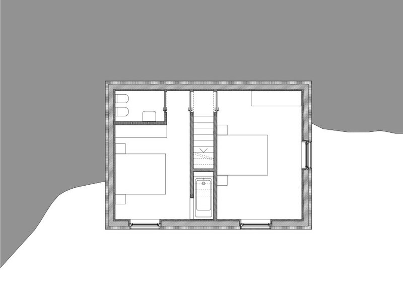 Upper floor plan with two bedrooms, central staircase, bathroom, and corner balcony cut into adjacent terrain