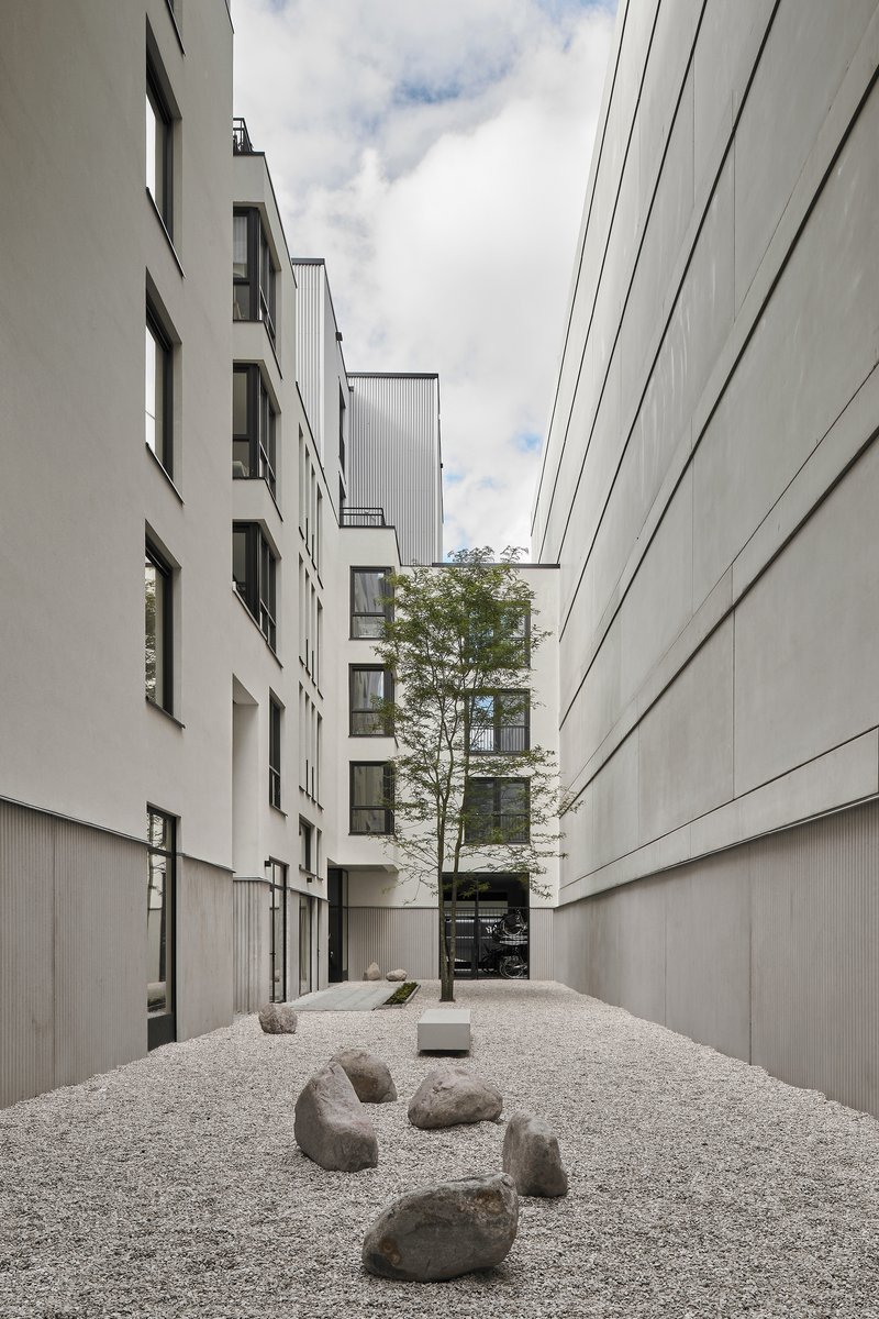 Common Practice and Studio AAAN Carve a Hidden Courtyard World into Amsterdam's Narrowest Plot