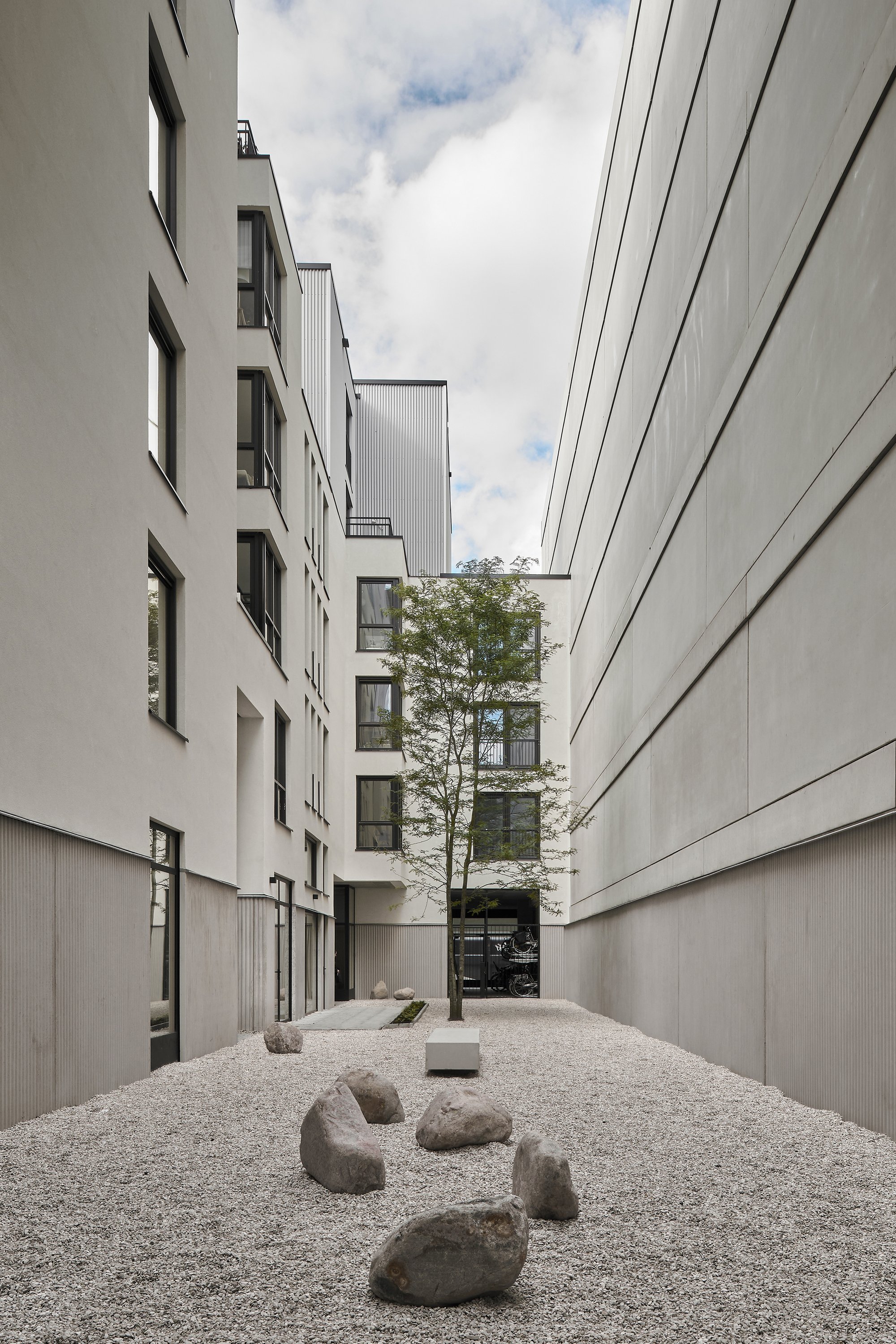 Common Practice and Studio AAAN Carve a Hidden Courtyard World into Amsterdam's Narrowest Plot