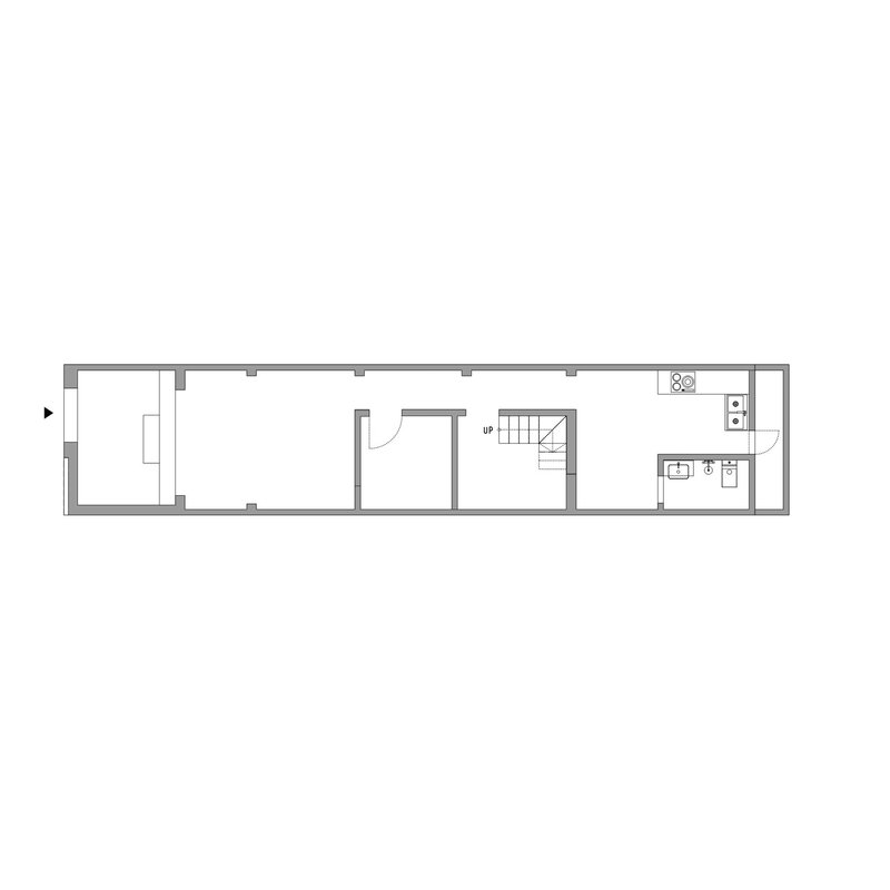 Floor plan drawing showing a narrow linear layout with stair, bathroom and kitchen on the right
