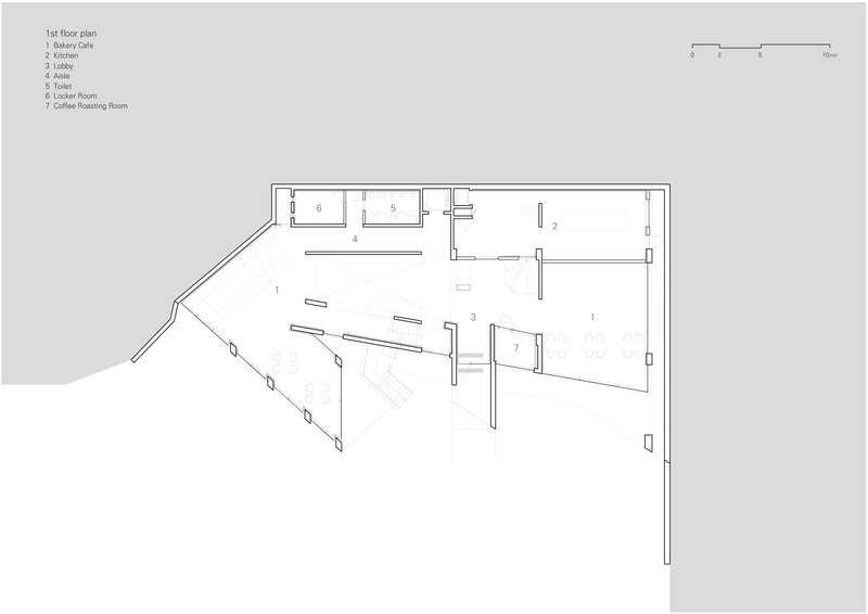 First floor plan drawing showing a bakery cafe with an angled wing and service spaces
