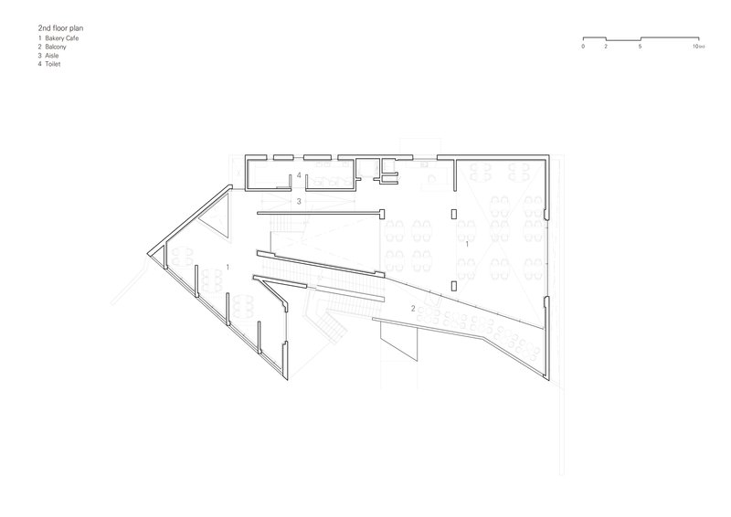 Second floor plan drawing showing interior spaces divided by diagonal circulation elements
