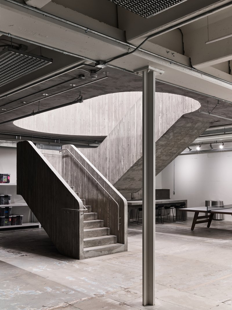 Scott & Scott Architects Carve a Concrete Staircase Through a 1973 Vancouver Warehouse for Purple Brand