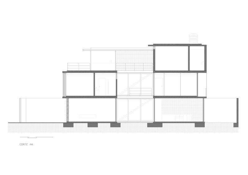 Section drawing revealing three stacked levels with offset floor plates and a connecting stair
