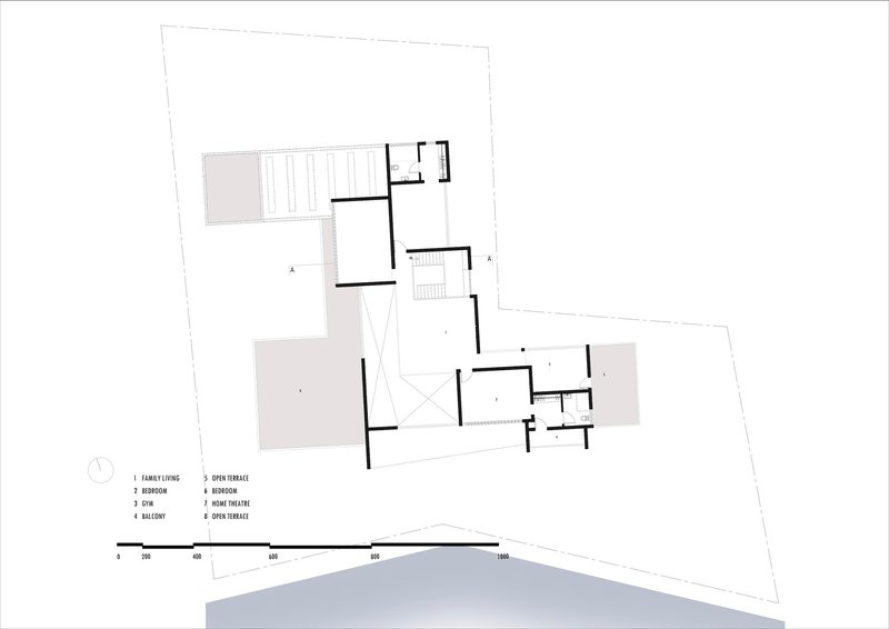 Upper level floor plan drawing depicting bedroom wing, terrace, and internal circulation across angular volumes