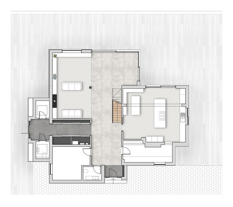 Floor plan drawing showing living spaces, kitchen, staircase and bathrooms arranged around a central circulation zone