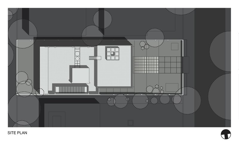 Site plan drawing showing a rectangular building footprint surrounded by circular tree canopies