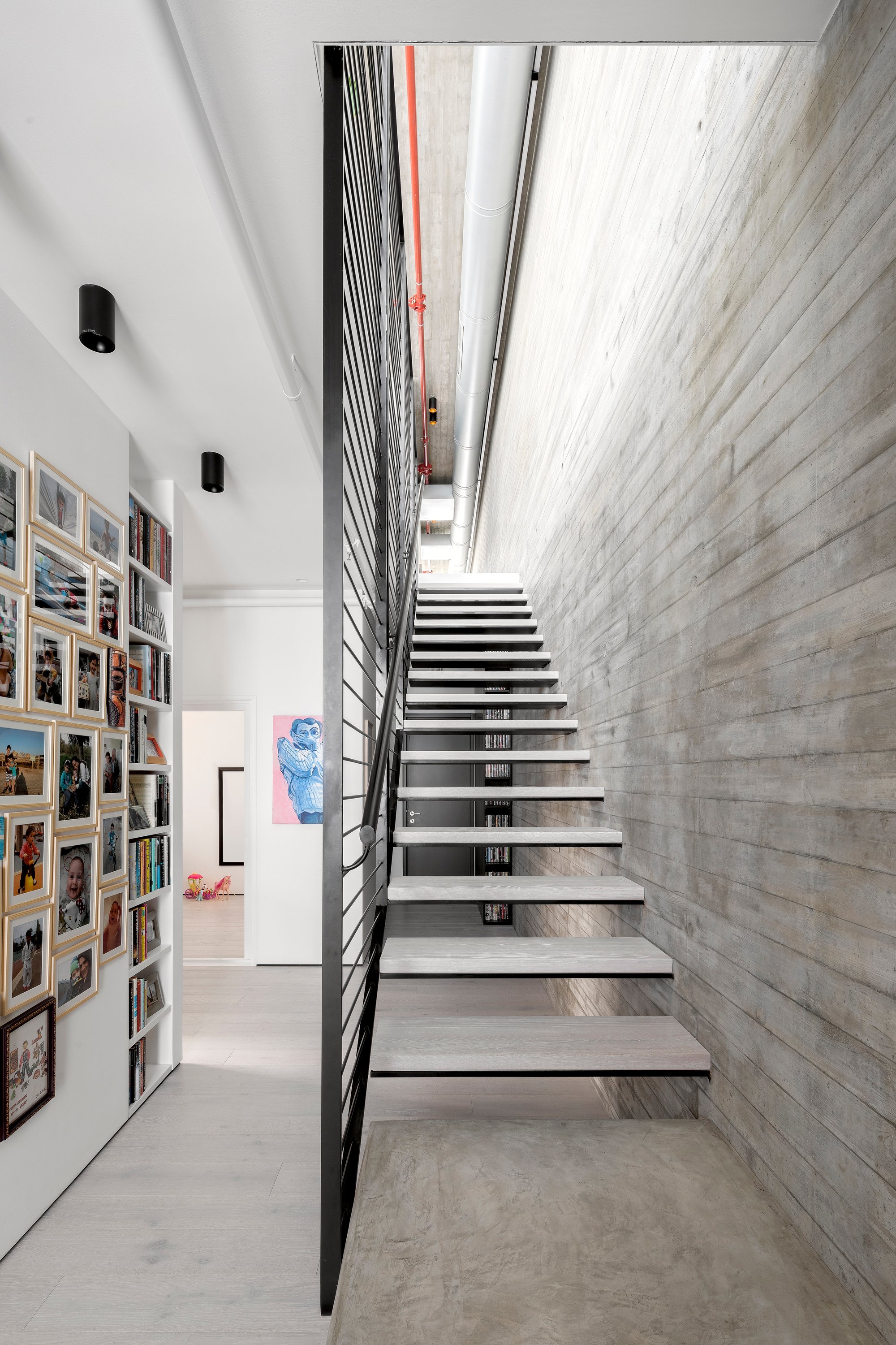 Erez Shani Architecture Flips a Tel Aviv Duplex Upside Down to Chase Light and Air