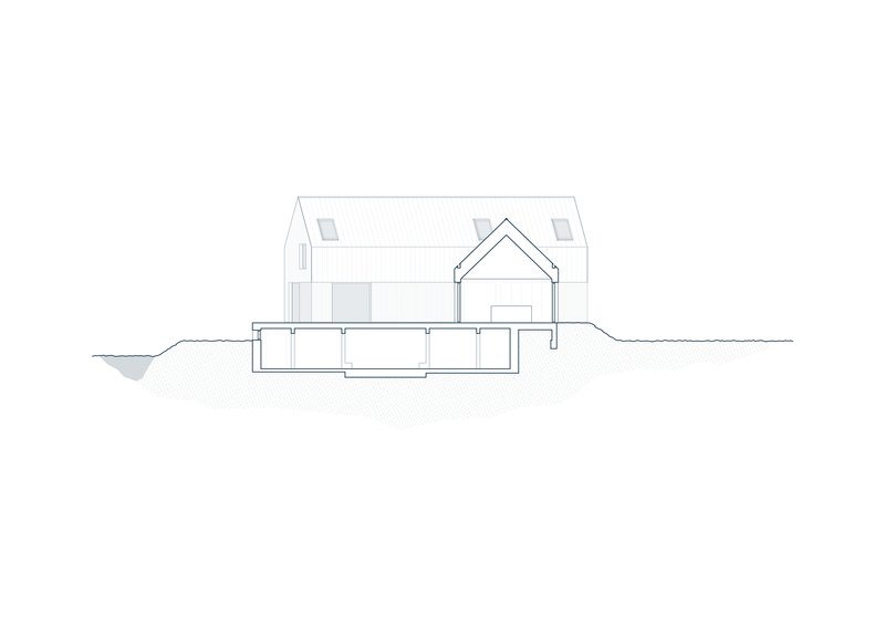 Section drawing showing gabled house form with lower level partially embedded in sloping terrain