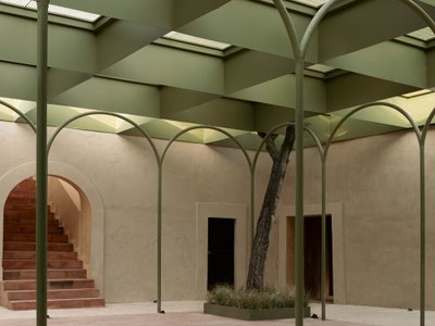 OMAC Arquitectos Restores a 19th-Century Bernal Courtyard into a Skylit Shopping Center