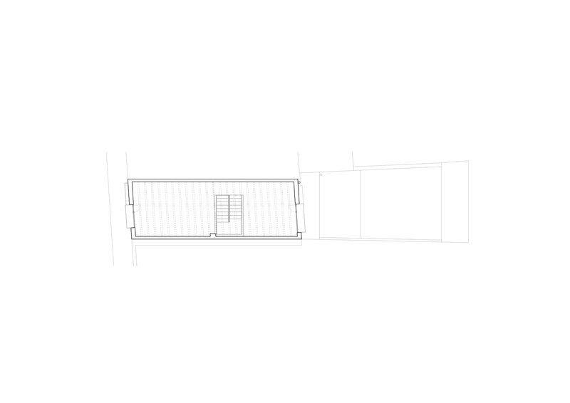 Floor plan drawing of upper level with central stair and rectangular floor layout