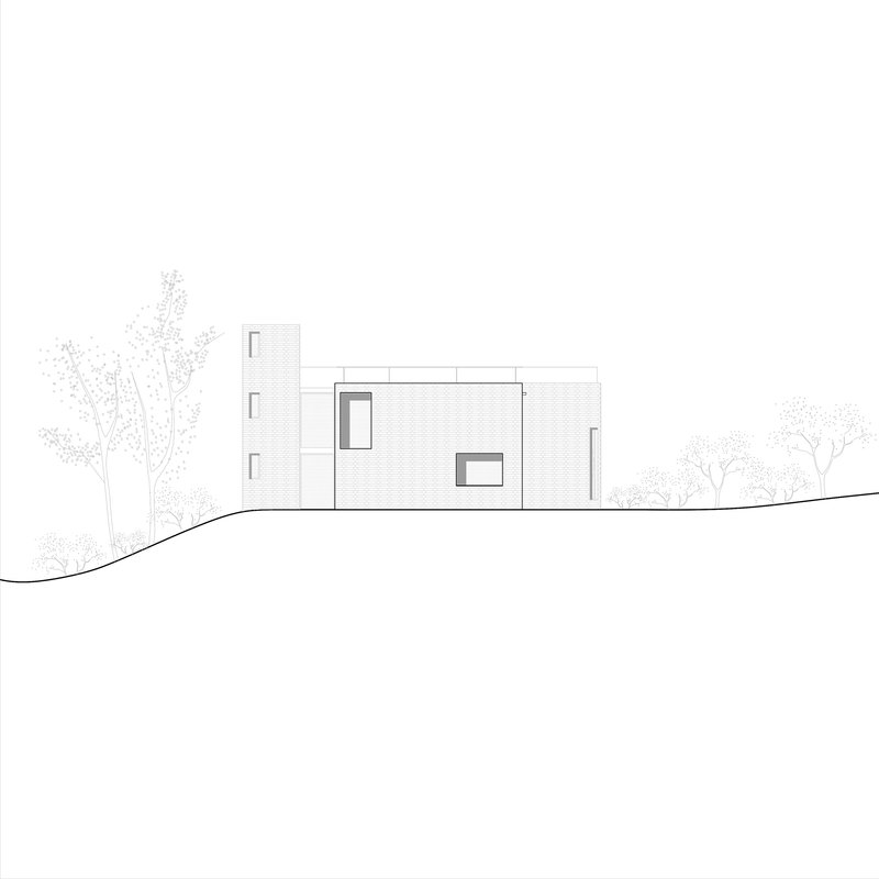 Elevation drawing showing a three-story tower and horizontal volume with framed openings on sloping terrain