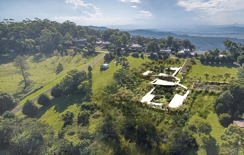 Aerial view of the mountain-top sanctuary woven into the Queensland landscape and eucalyptus canopy.