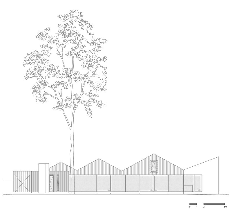 Elevation drawing showing low-pitched roofline with vertical siding and a mature tree in foreground