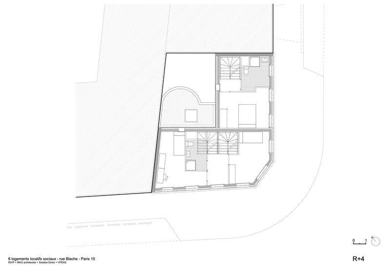 Fourth floor plan drawing showing two bedroom suites separated by central stair volumes