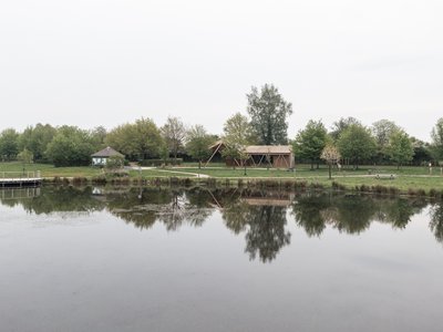 Atelier MA Builds a Twisting Timber Pavilion at the Edge of a French Forest Pond