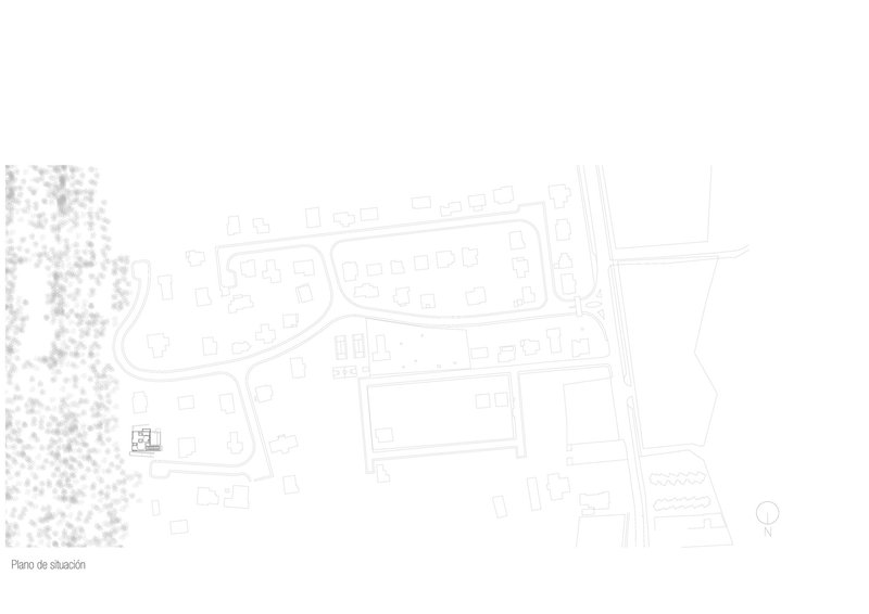 Site plan drawing showing the building footprint within a residential neighborhood and treed area
