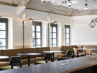 Moreno Architecture Converts a Luxembourg Spa Attic into a Work Café for PwC