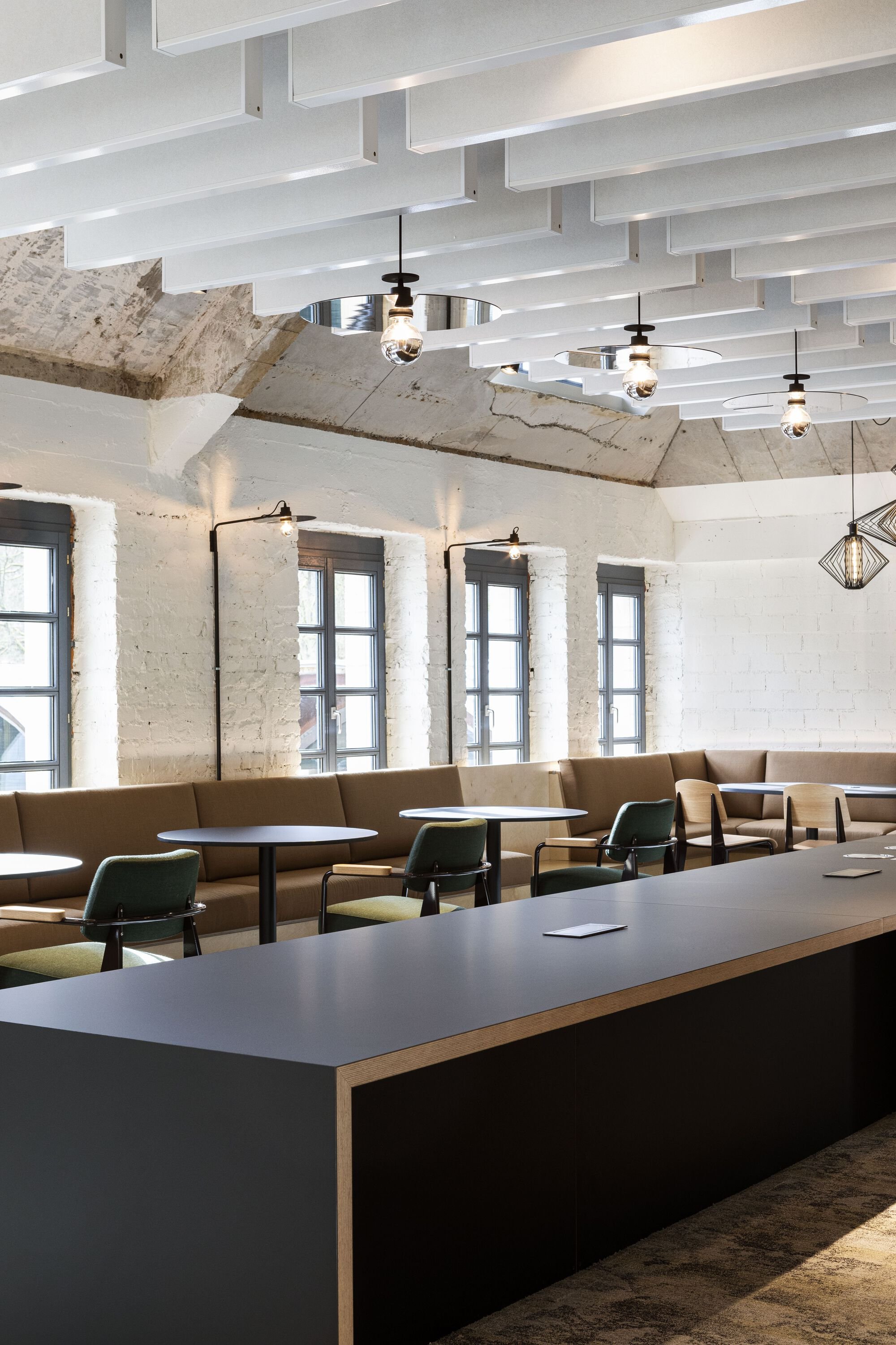 Moreno Architecture Converts a Luxembourg Spa Attic into a Work Café for PwC