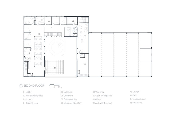 Second floor plan drawing showing office workspaces, a central atrium void, and an adjacent workshop hall