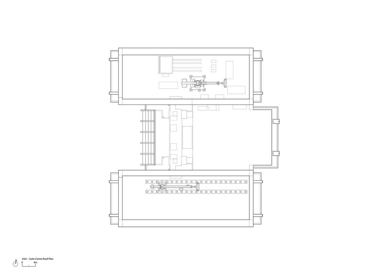 Roof plan drawing showing three rectangular volumes with mechanical equipment and structural grids