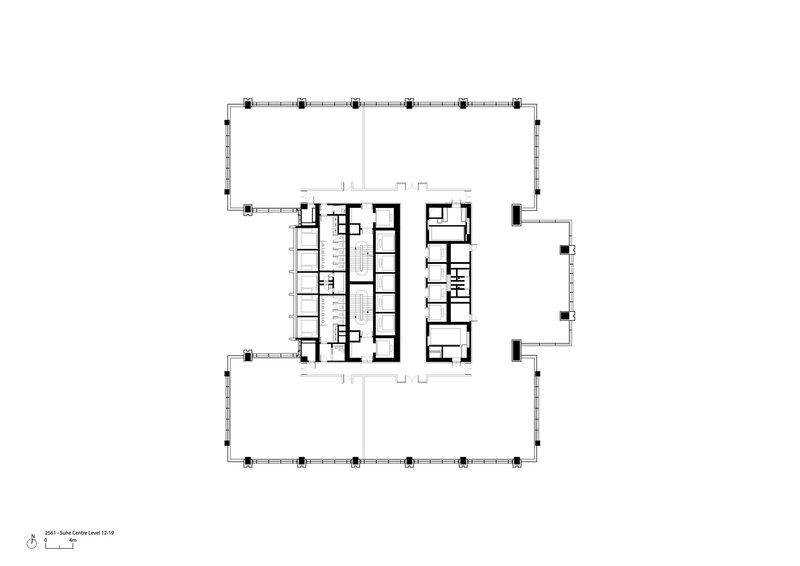 Floor plan showing central core with stairwells flanked by linear room arrangements and perimeter columns