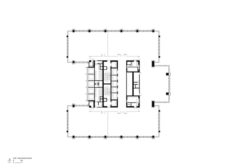 Floor plan showing central service core with vertical circulation and adjacent rooms within a column grid