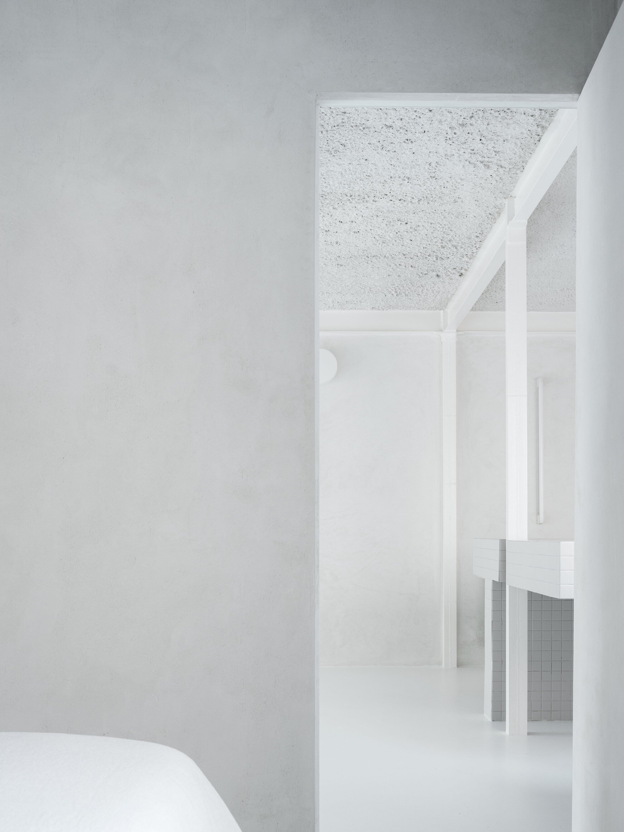 HANGHAR Strips a Madrid Apartment Back to Its Bones to Make Homeownership Possible