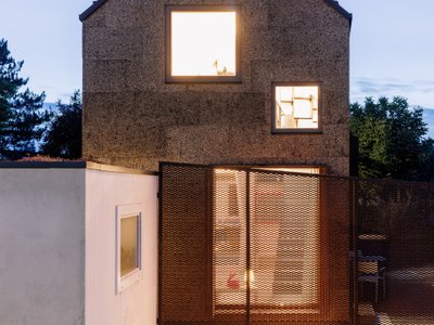 Studio Bauform Extends a Corten House in Homburg with a Cork-Clad Volume and Folded Roof