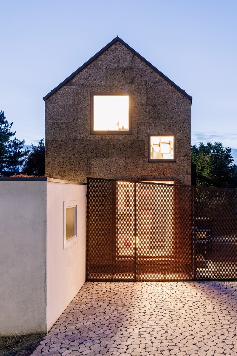 Studio Bauform Extends a Corten House in Homburg with a Cork-Clad Volume and Folded Roof