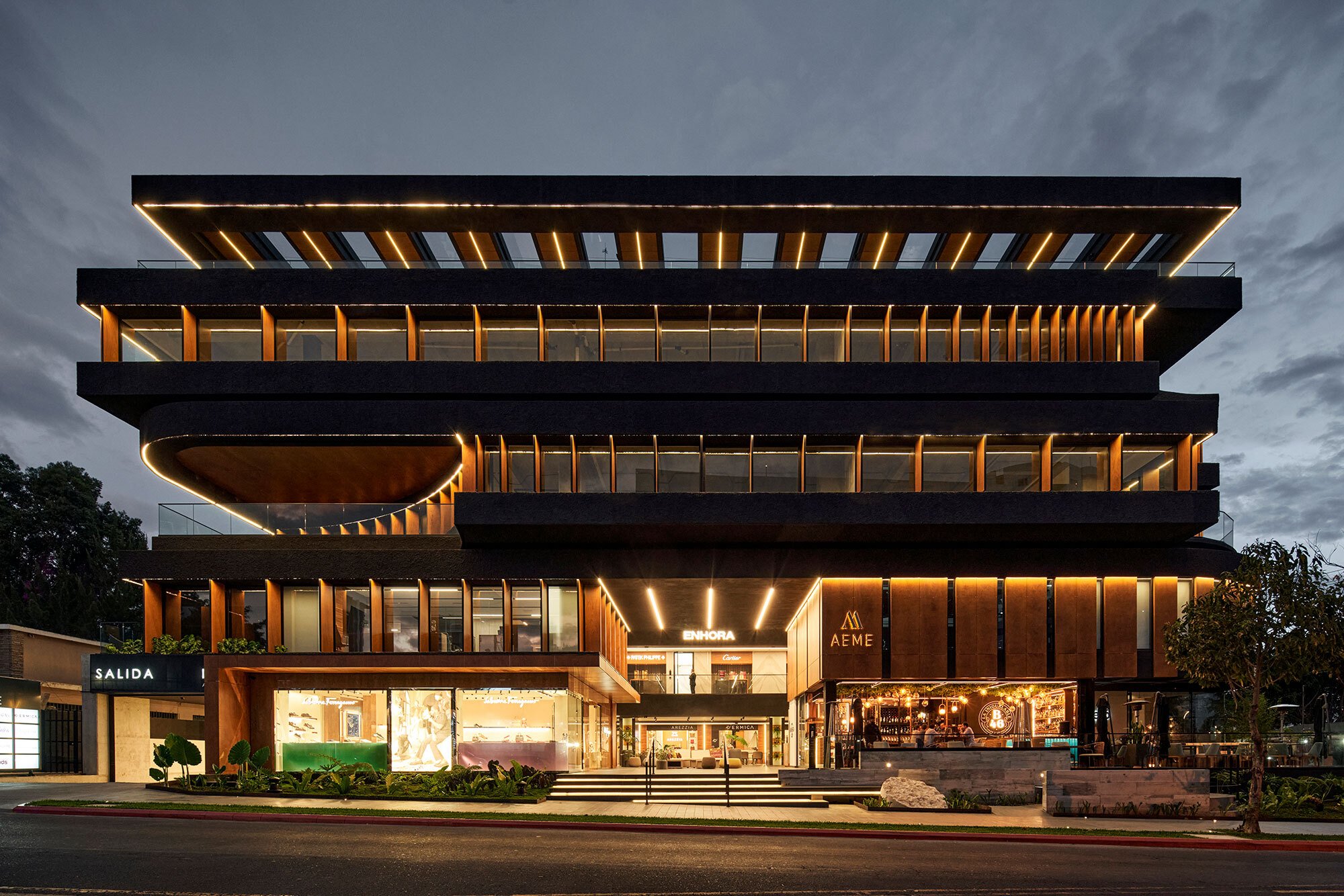Paz Arquitectura Wraps a Guatemala City Mixed-Use Tower in Rotating Timber Fins