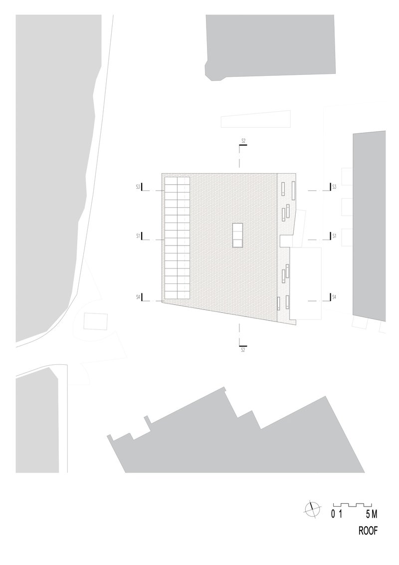 Roof plan drawing with gridded surface and central mechanical equipment enclosure