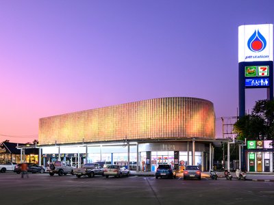 Sher Maker Wraps a Chiang Mai Gas Station in Thousands of Handmade Ceramic Tiles