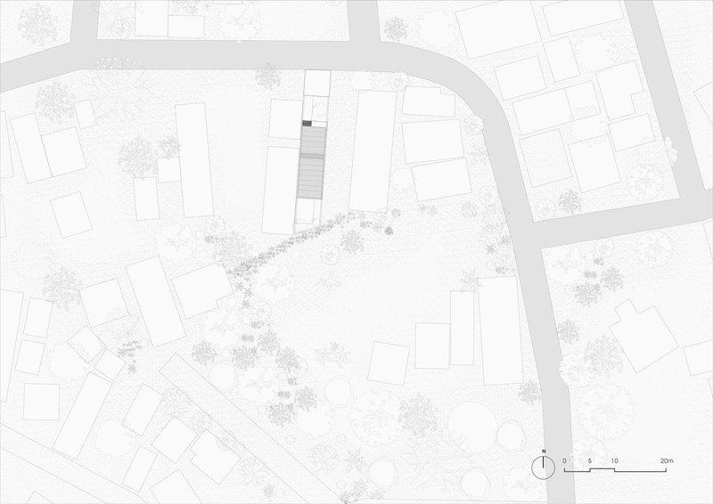 Site plan drawing showing a narrow rectangular lot among surrounding residential parcels and street trees