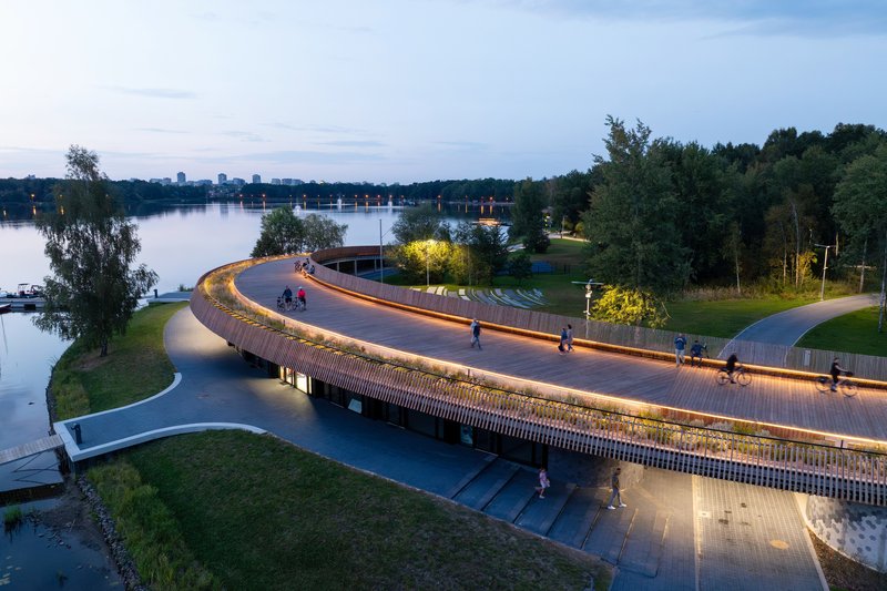 Robert Skitek Wraps a Timber Promenade Around a Polish Lake to Complete a Decade-Long Waterfront